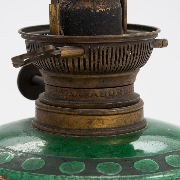 Alfred William Finch,  An early 20th century oil lamp by Iris, Finland.