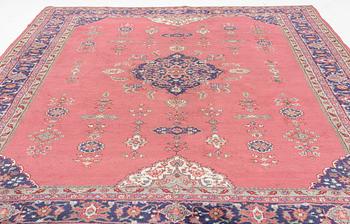 An oriental/eastern European carpet, c. 355 x 275 cm.