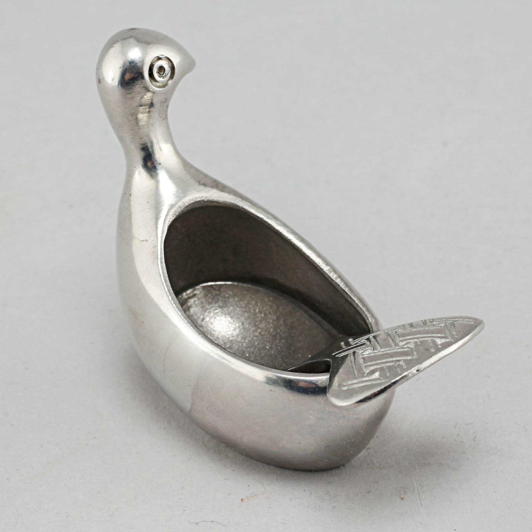 A "Kirun" salt bowl with spoon in pewter, made by Lars Pirak, second half of the 20th century.