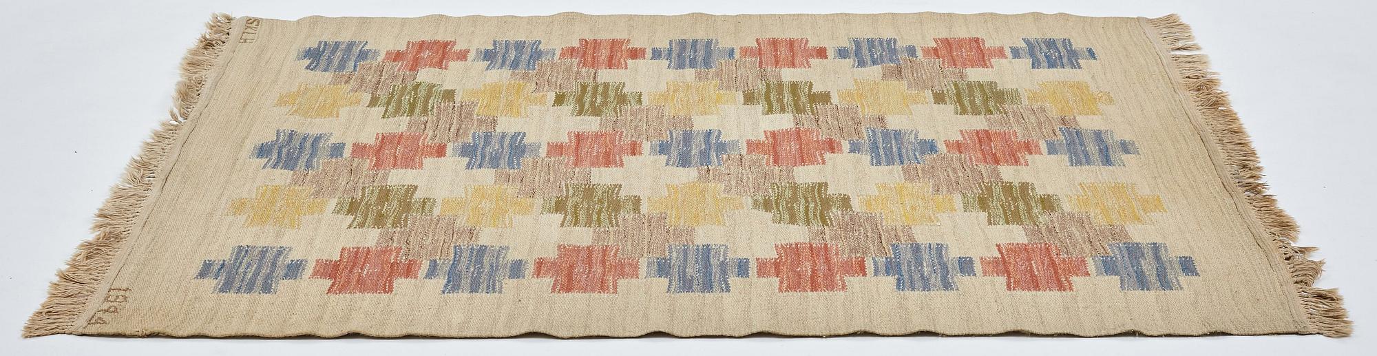 Swedish design, a carpet, knotted pile in relief, ca 178,5-179,5 x 137-140,5 cm, signed and dated at the back: SKLH 1944.