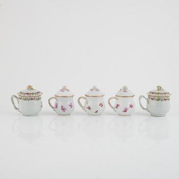 Five porcelain custard cups in various models, 19th-20th Century.