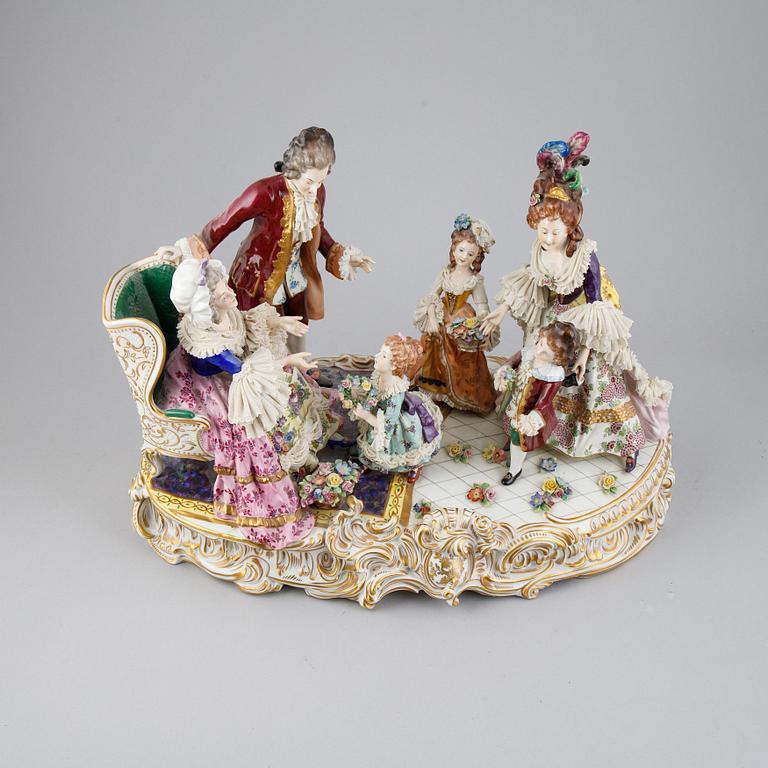A Rococo style porcelain figurine group, Rudolstadt Volkstedt, Germany, early 20th Century.