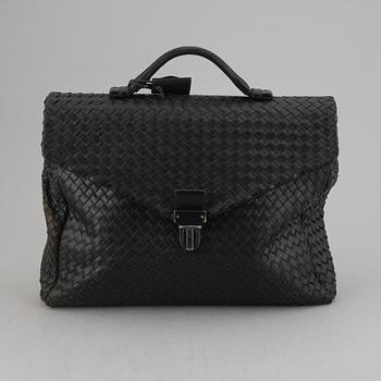 Bottega Veneta, a black intrecciato leather briefcase.
