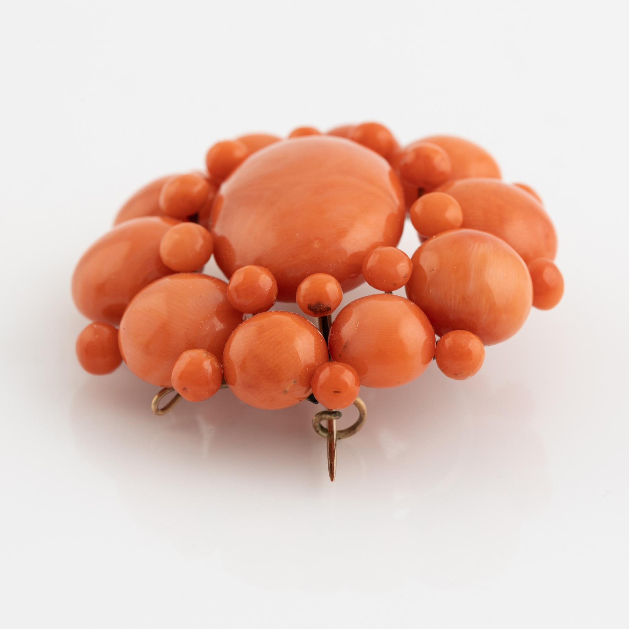 Coral brooch.