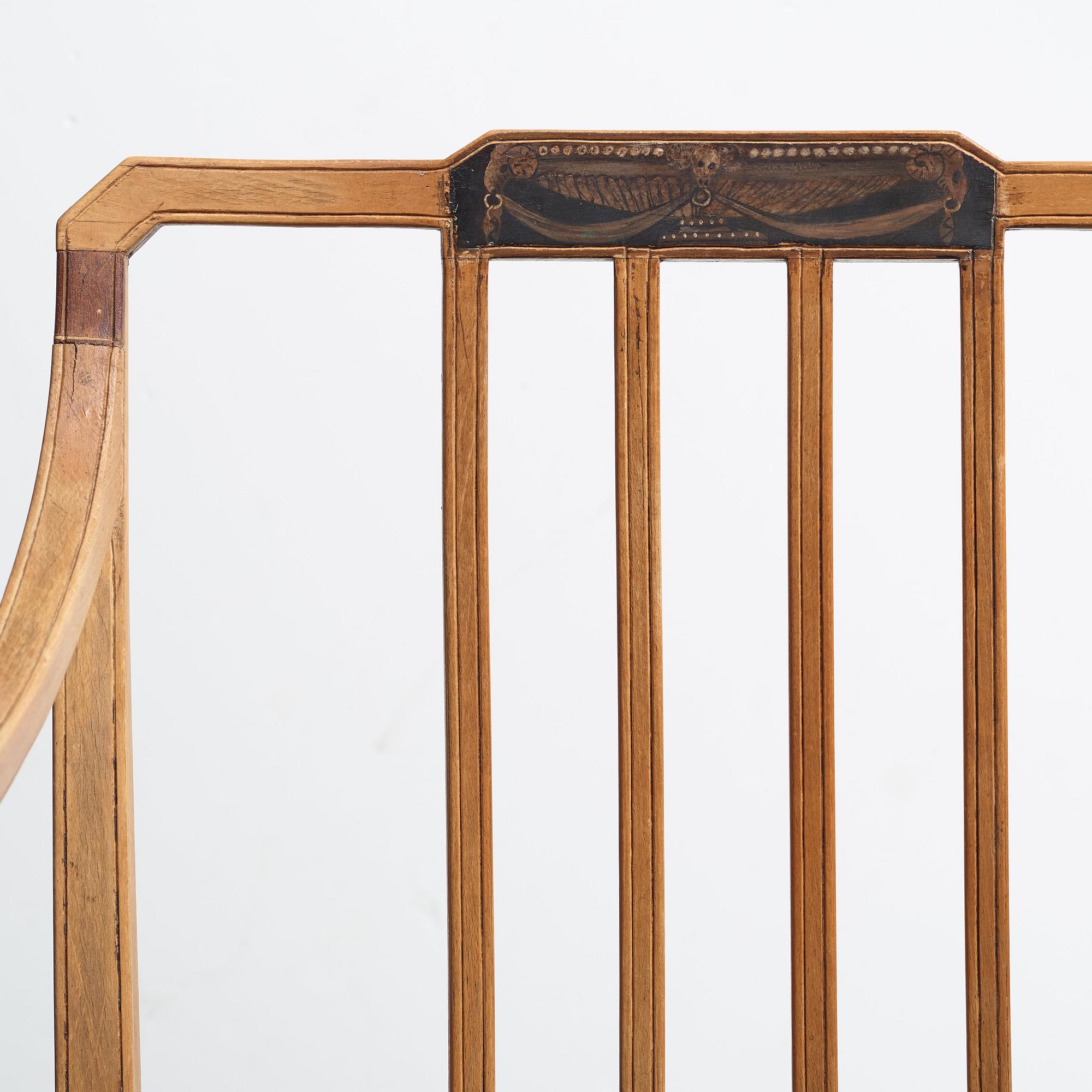 A pair of English armchairs, circa 1800.