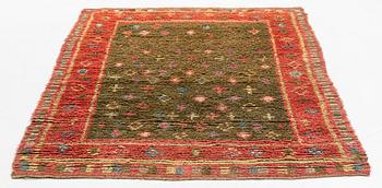 A finish knotted pile bed cover, ca  195 x 142 cm, dated 1830.