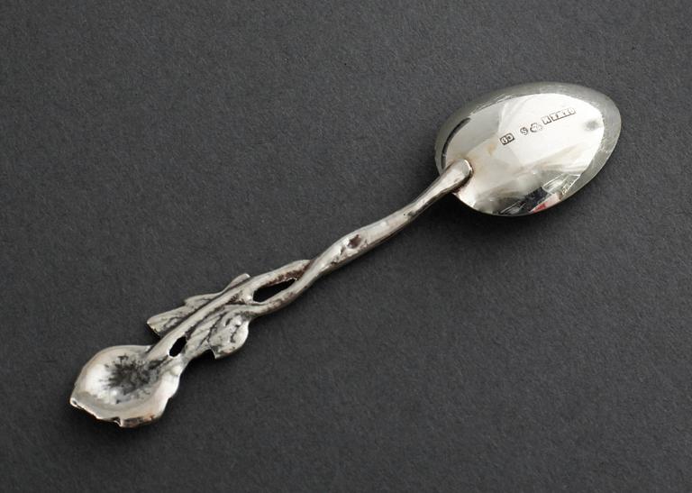 22 swedish silver spoons and one ladle, from the 19th and 20th century.