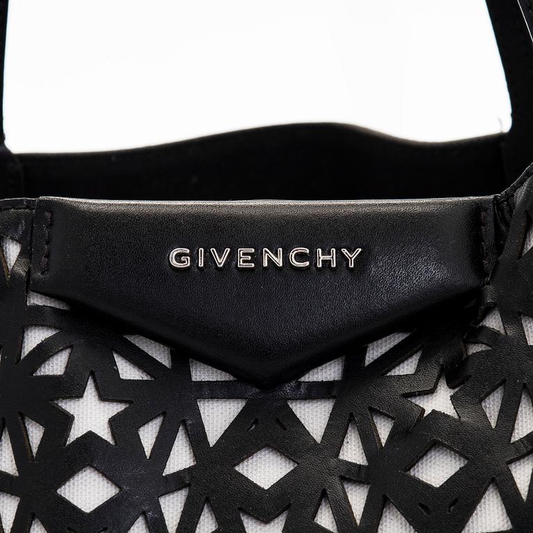 Givenchy, a 'Star Perforated Antigona Shopper' bag.