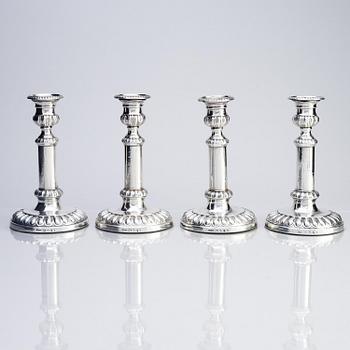 Four English silver candlesticks, marks of John Roberts & Co, Sheffield 1808.
