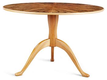 636. A Carl Malmsten burrwood table, Sweden.