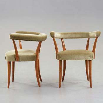 Josef Frank, a pair of mahogany horseshoe chairs, Svenskt Tenn, Sweden, mid 20th Century, model 966.