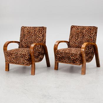 A pair of armchairs, mid-20th Century.