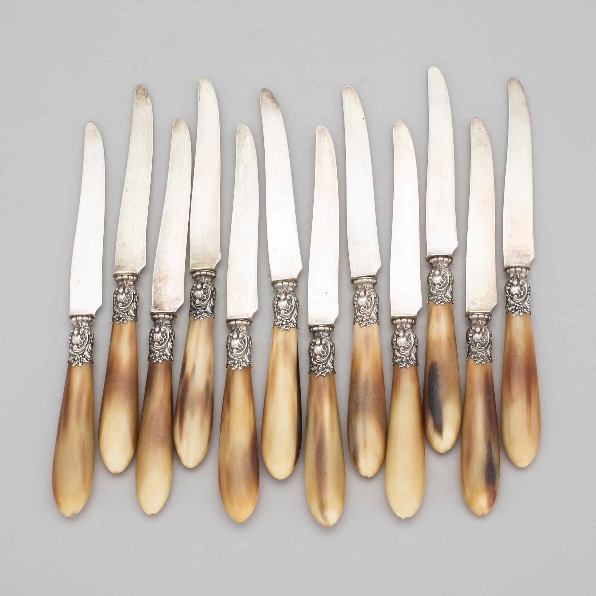 FRUKTKNIVAR, 12 st, silver och horn, Paul Canaux & Cie, 1892-1911, Paris. Total vikt 386 g.