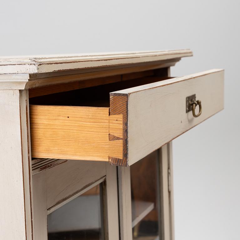 Display cabinet, early 20th century.