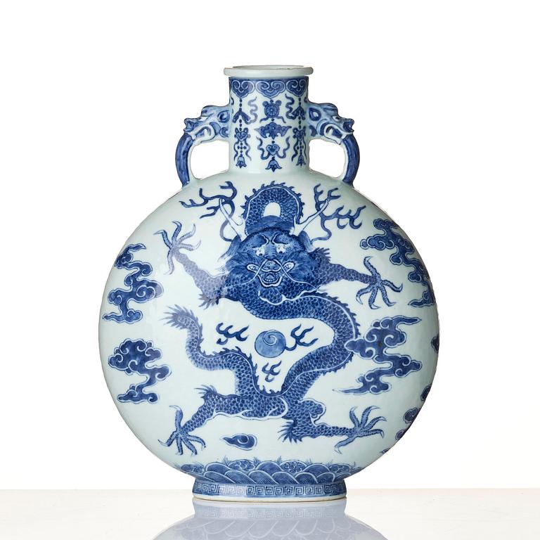 A blue and white 'dragon' moon flask, bianhu, Qing dynasty, 19th century.