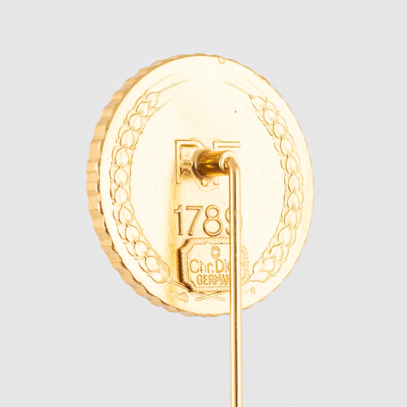 Christian Dior, necklace and pin.