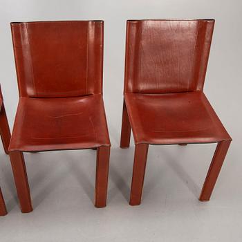 A set of four Matteo Grassi leather chairs alter part of the 20th century.