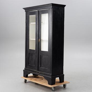 Display cabinet, circa 1900.