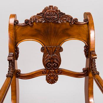 A Set of Two Armchairs and Eight Chairs, biedermeier, Mid-19th Century.