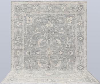 A carpet, Ziegler design, approx. 427 x 305 cm.