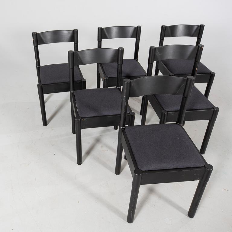 Vico Magistretti, a set of six chairs.