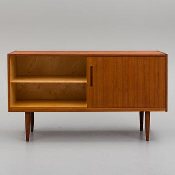 A 'Lyon' teak veneered sideboard designed by Nils Jonsson, Hugo Troeds Bjärnum, Sweden.