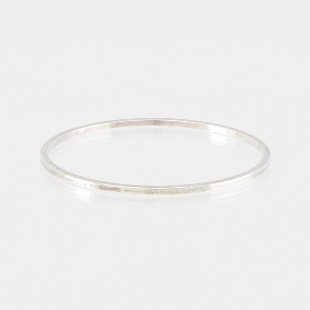 Elon Arenhill, armringar 2 st silver, Malmö 1964 och 1991.