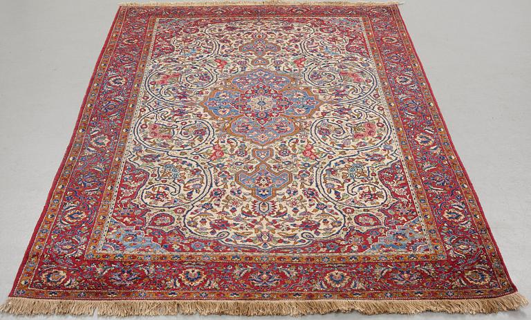 Matto, a semi-antique silk Kashan, ca 212,5-214,5 x 134,5-135,5 cm.