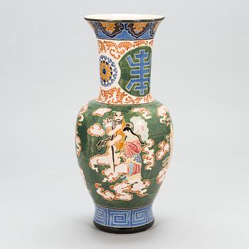 A Chinese 1950s ceramic floor urn.