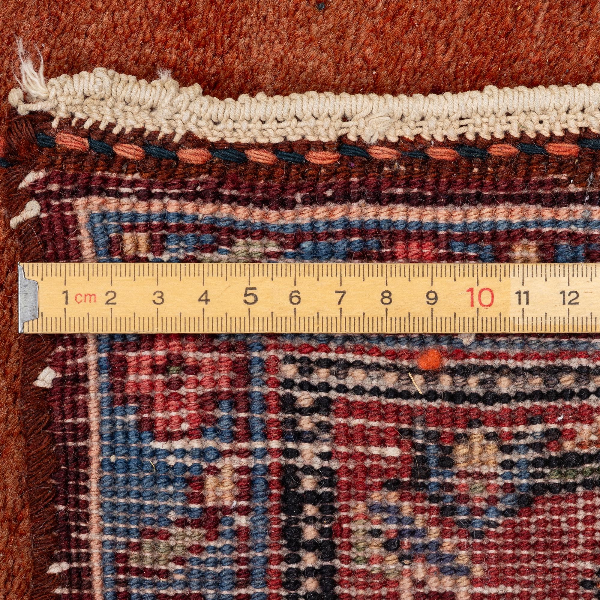 A semi-antique Bidjar rug, c. 255 x 135 cm.