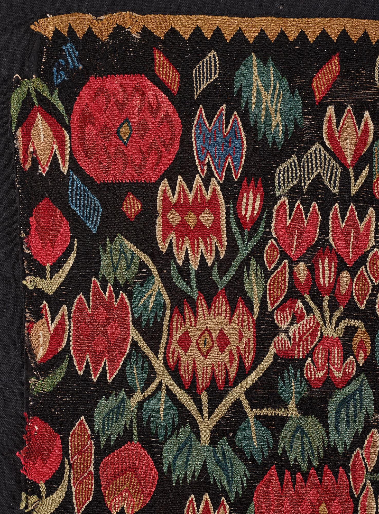 A carrige cushion fragment, 'Blomstermosaik', tapesty weave, c 61 x 48 cm, Scania, around the year 1800.