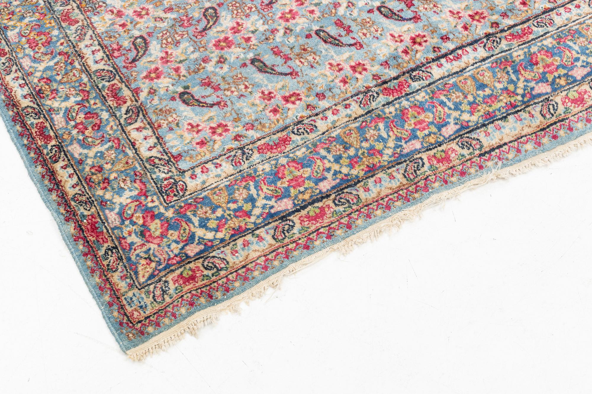 A Persian rug, c. 220 x 140 cm.