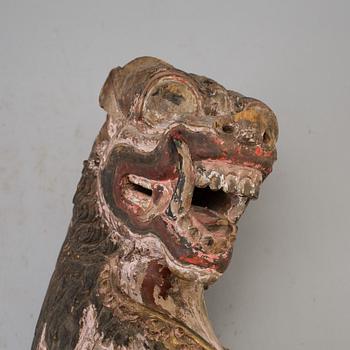 A wooden mythical beast, Southeast Asia, early 20th Century.