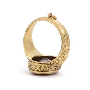 A signet ring set with amethyst.