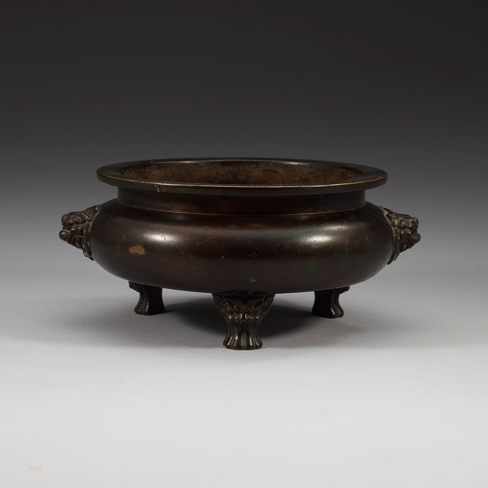 A large bronze tripod censer, Ming dynasty (1368-1644), with Xuande six character mark.