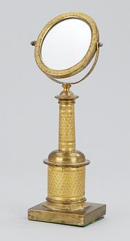 An Empire table mirror.