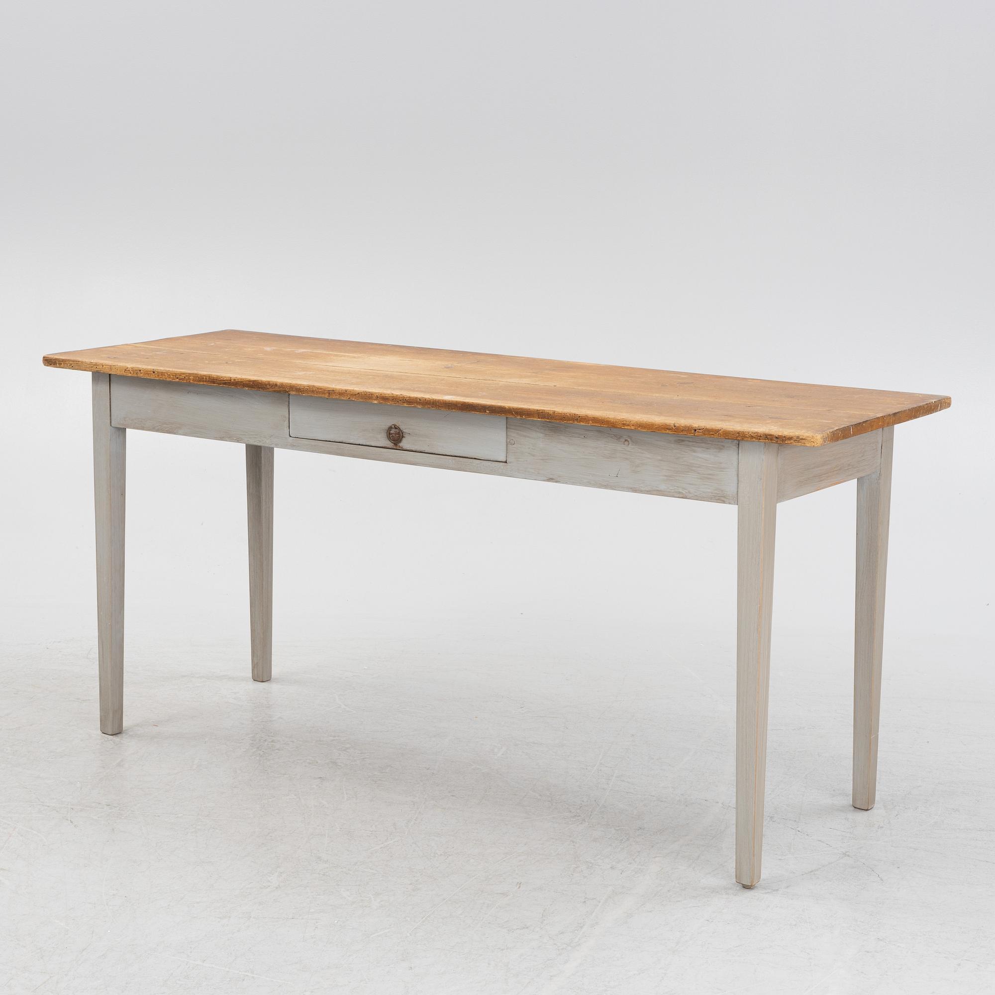 A painted pine table, contemporary with older parts.