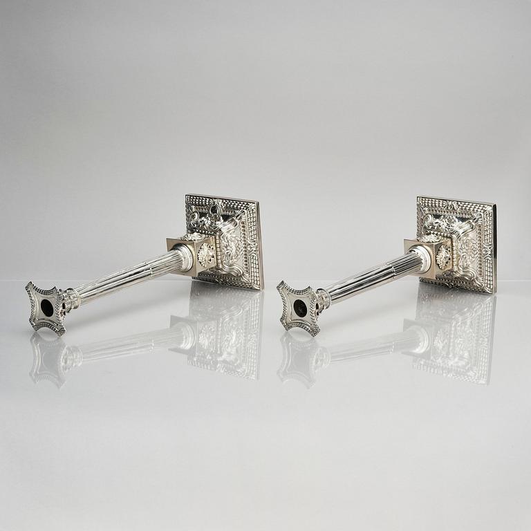 A pair of 18th century silver candlesticks, marks of Ebenezer Coker, London , possibly 1765.