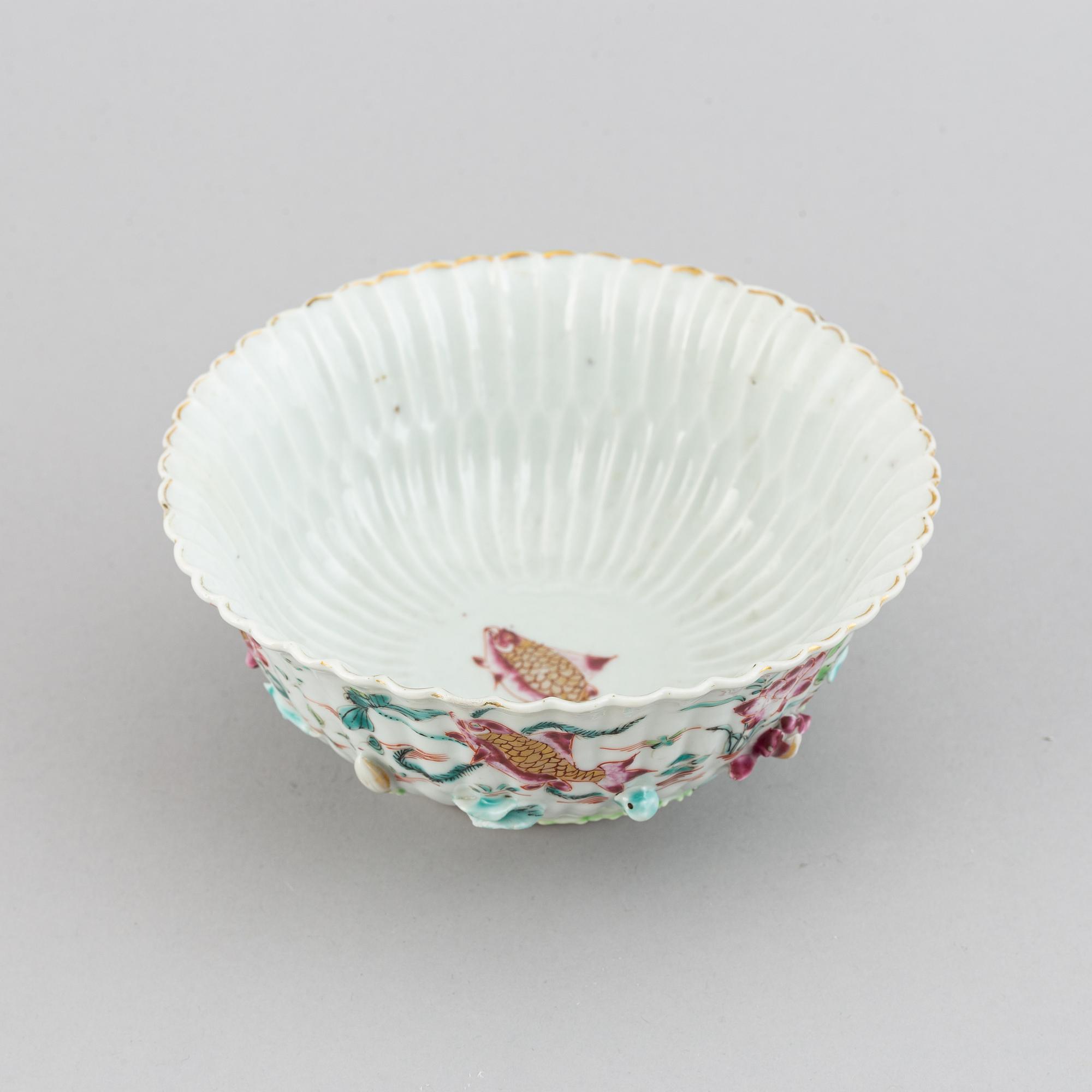 A famille rose relief moulded bowl, Qing dynasty, 18th century.