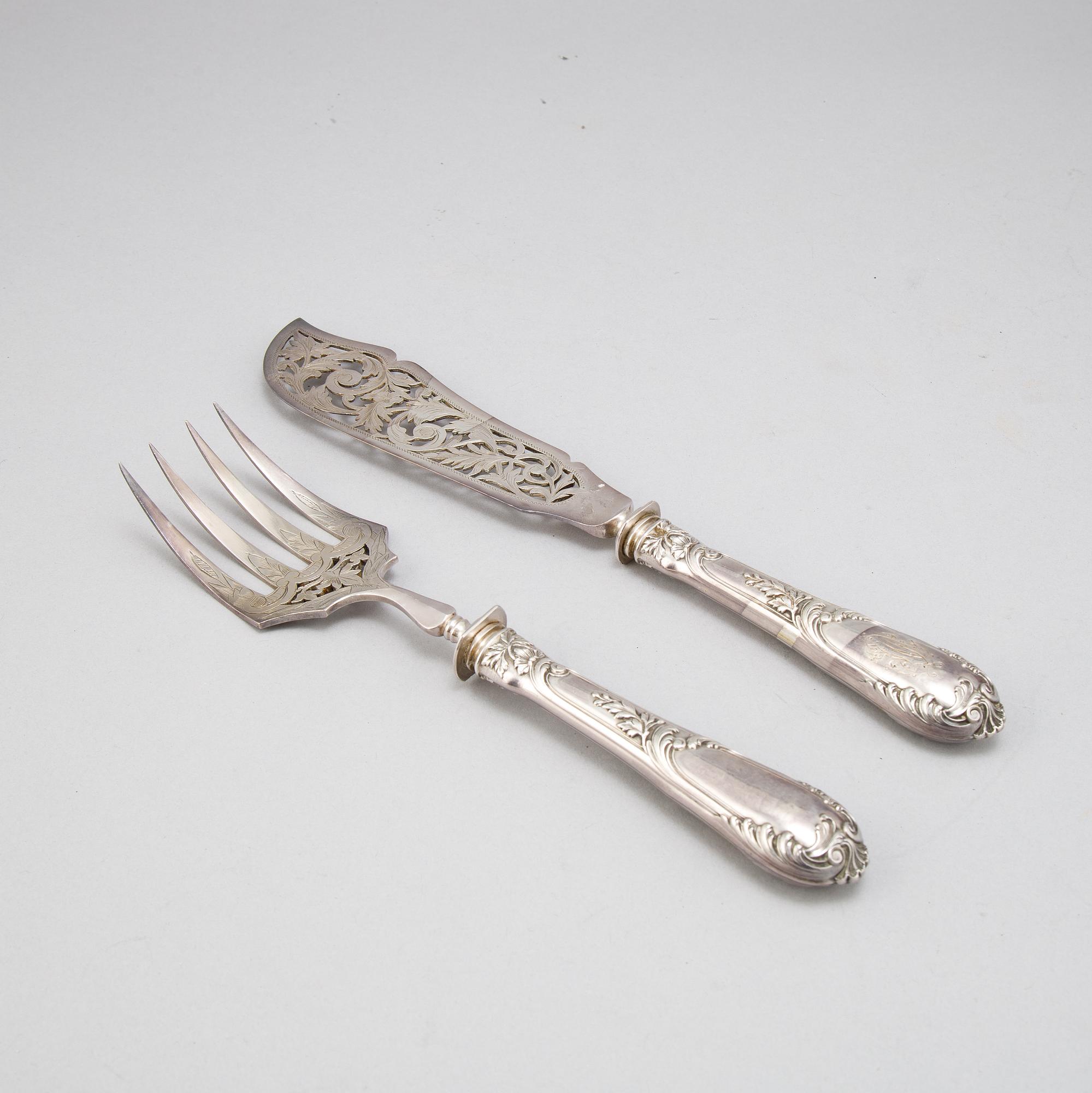 A pair of Louis VI-style serving cutlery, France 19th century.