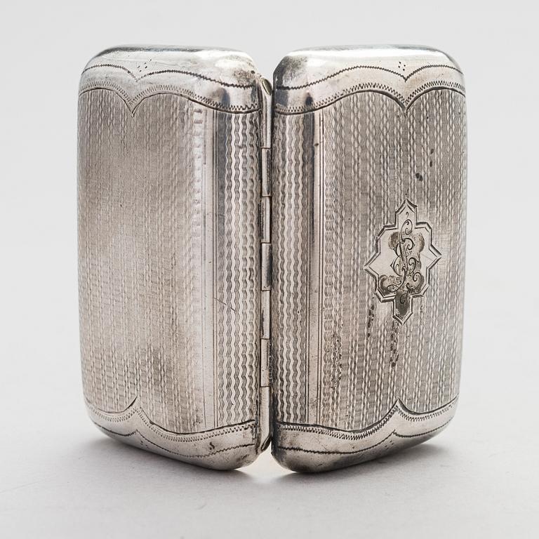 A Russian, parcel-gilt silver cigarette case, maker's mark of Karl Verlin, Saint Petersburg 1871-1878.