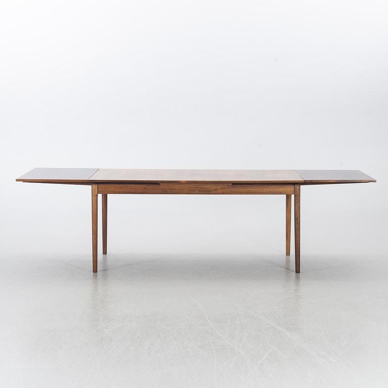 A Table from Slagelse Möbelvaerk A/S and 4 chairs, Niels Otto Møller, JL Møller. Denmark, 1960's.