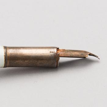 A silver case, Nikolai Kemper, and a pen and a paper knife in silver and enamel, import marks St Petersburg early 1900s.