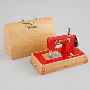 A toy Regina sewing machine from Germany from the mid 20th century.