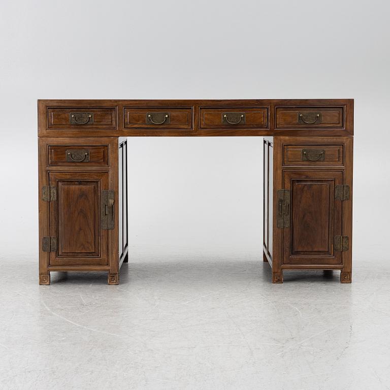 A Chinese hardwood desk, 20th century.