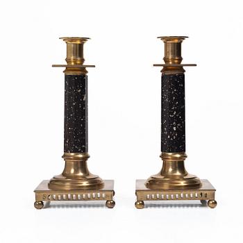 A pair of candlesticks brass and porphyry, EOS Jönköping, 20th century.
