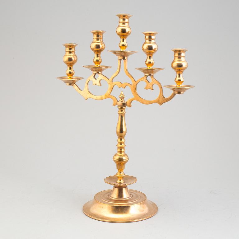 A pair of brass baroque style candelabra, early 20th century.