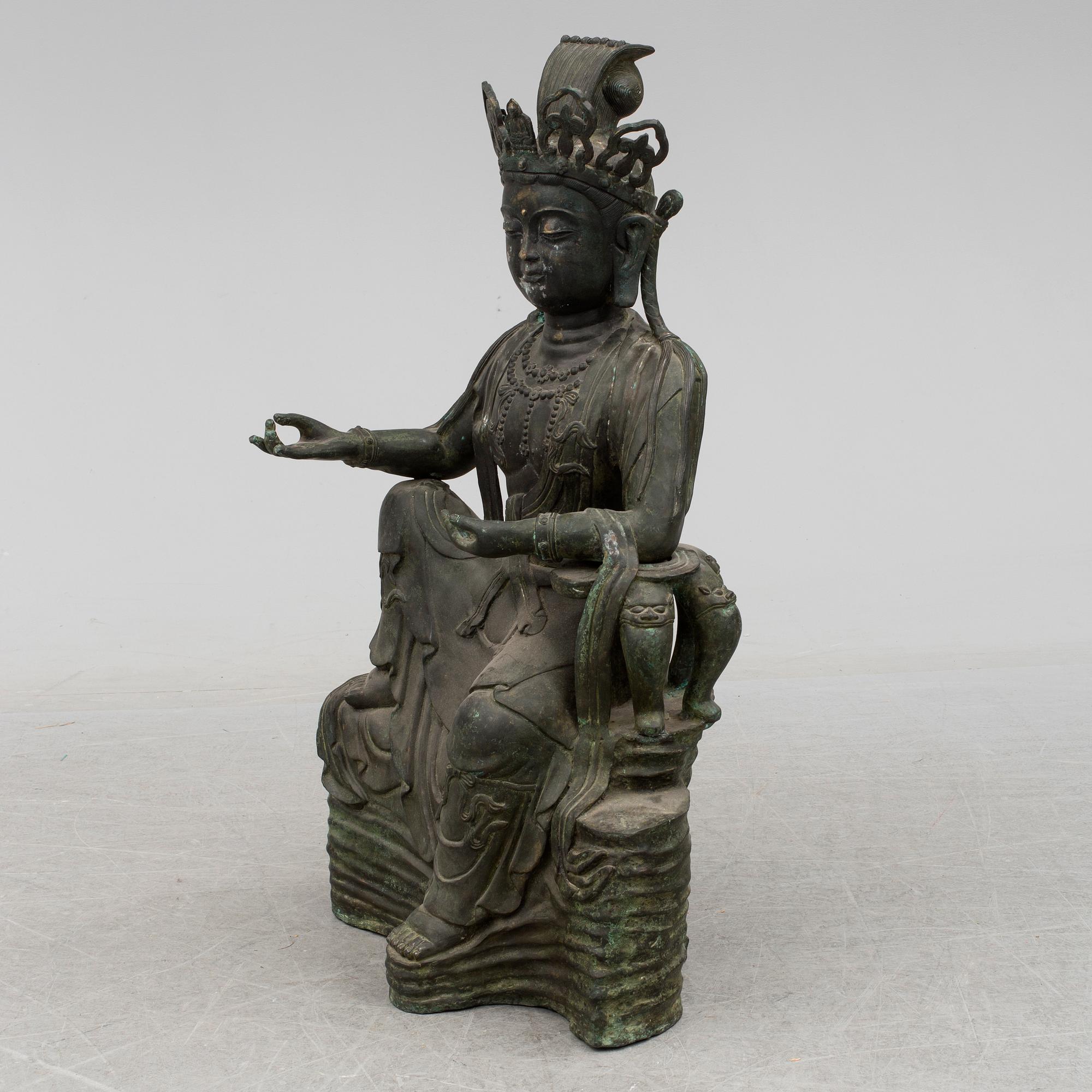 A mid 20th century metal Guan Yin figurine, China.