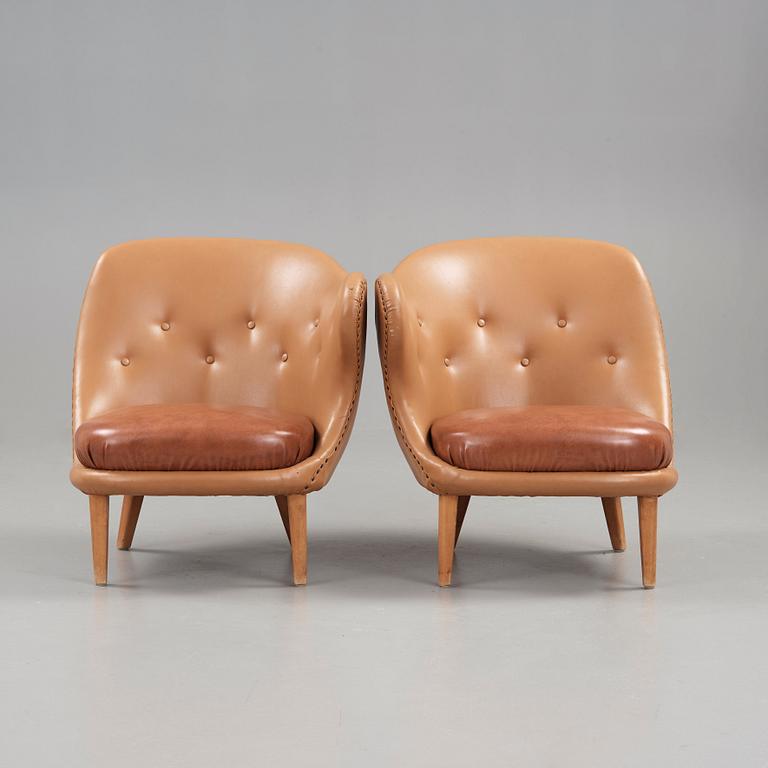Arne Norell, A pair of Arne Norell 'Tummen/ The Thumb' easy chairs, Gösta Westerbergs Möbler, Stockholm 1950's.