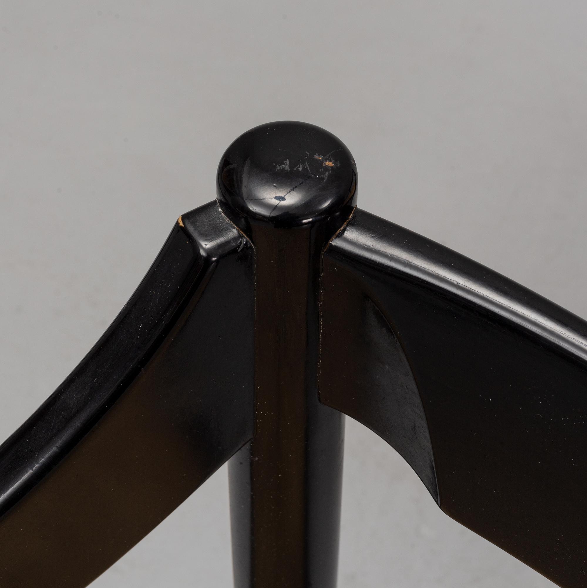 Vico Magestretti. Four black lacquered chairs with rope seats, "Carimate". Cassina, Italy.